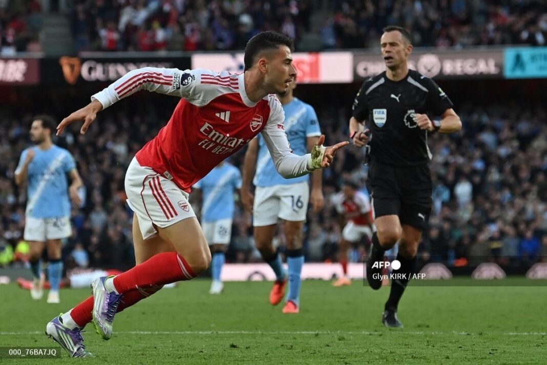 Arsenal harus rela berbagi poin dengan tamunya Manchester City setelah keduanya hanya bisa mencetak masing-masing satu gol.