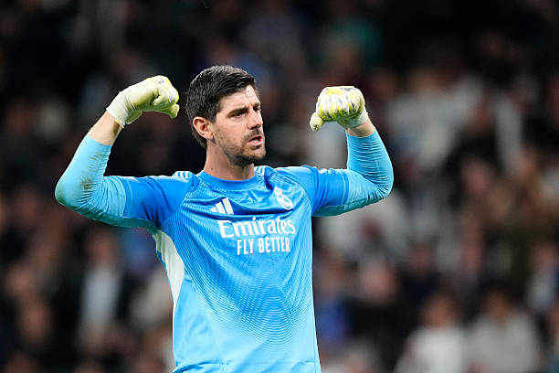 Thibaut Courtois, kiper Real Madrid dan Belgia, merayakan kemenangan setelah memenangkan pertandingan leg pertama babak 16 besar Liga Champions UEFA 2025/26 antara Real Madrid CF dan Manchester City FC di Estadio Santiago Bernabeu pada 11 Maret 2026 di Madrid, Spanyol. (Foto oleh Jose Breton/Pics Action/NurPhoto via Getty Images)